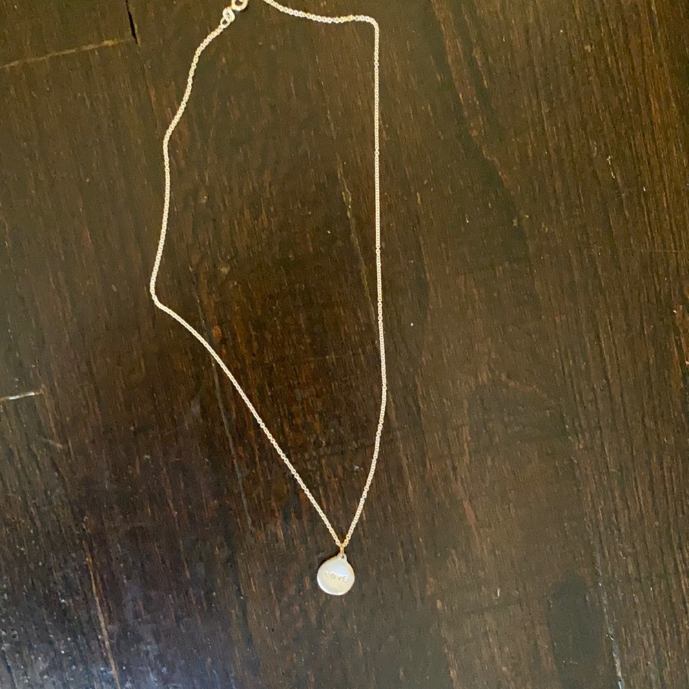 New sterling silver Helen Ficalora necklace with “love” pendant.